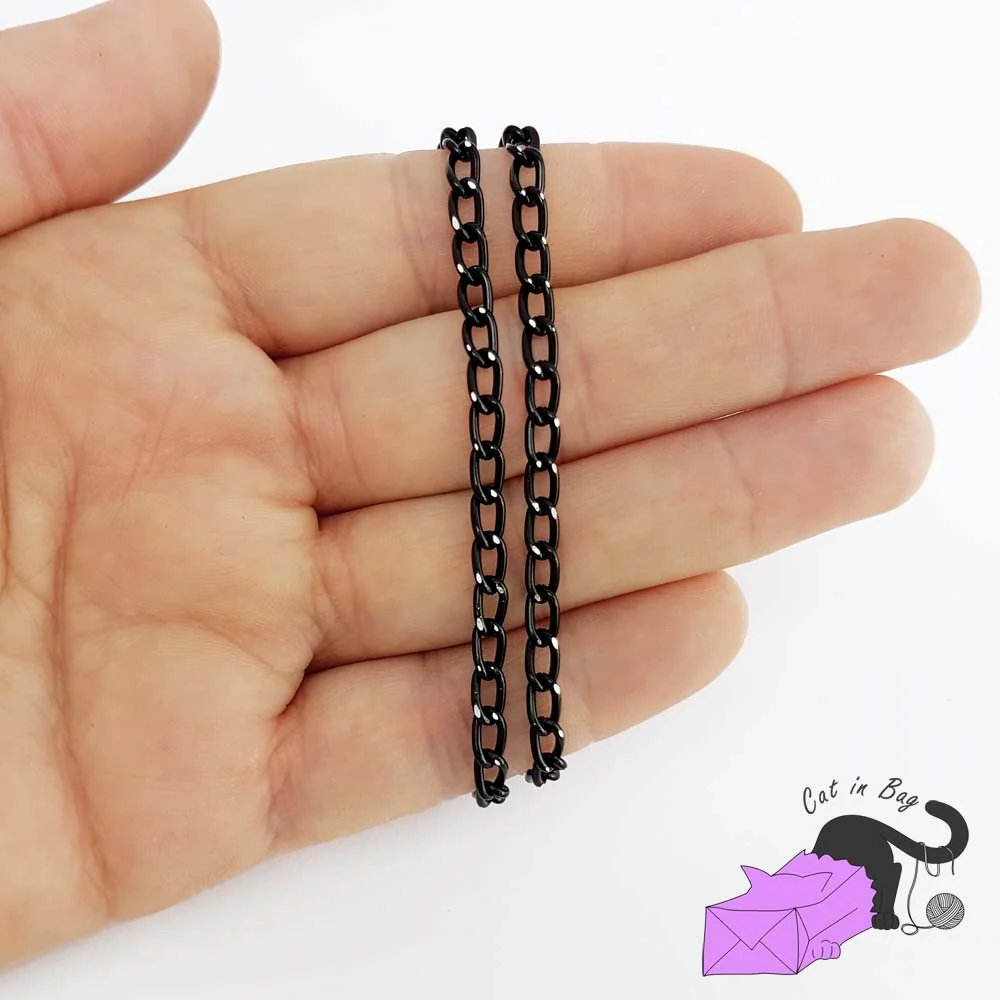 Catena alluminio nera 6x3.5 mm Cat in Bag