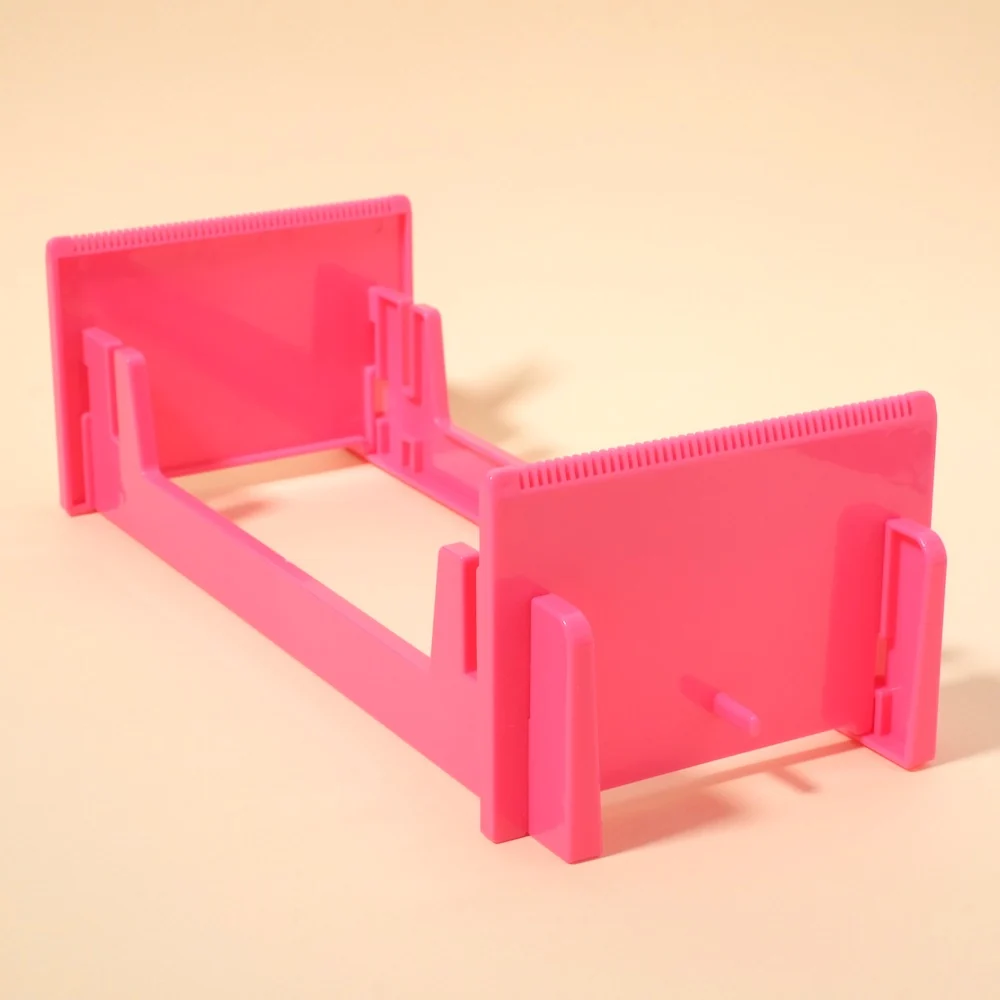 Telaio rosa per tessitura di braccialetti con perle