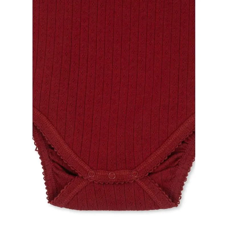 Certificato CE Konges Sløjd Minnie Body - GOTS - Rosso Dahlia
